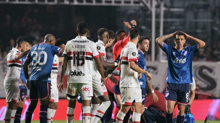 Uruguayan league put on hold as Nacional star Juan Izquierdo remains in intensive care after suffering cardiac arrest during Copa Libertadores game against Sao Paulo